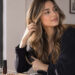 San Antonio woman styling hair quickly in the morning using dry shampoo and leave-in conditioner